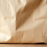 Showcase of a durable torba papierowa being filled with fresh organic produce, emphasizing